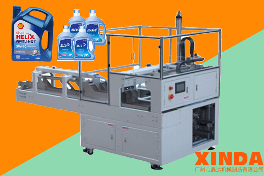 洗衣液定制型裝箱機_桶裝潤滑油裝箱機（跌落式）-廣州鑫達(dá)機械